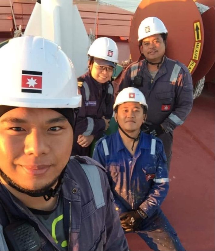 Diversified crew on ship