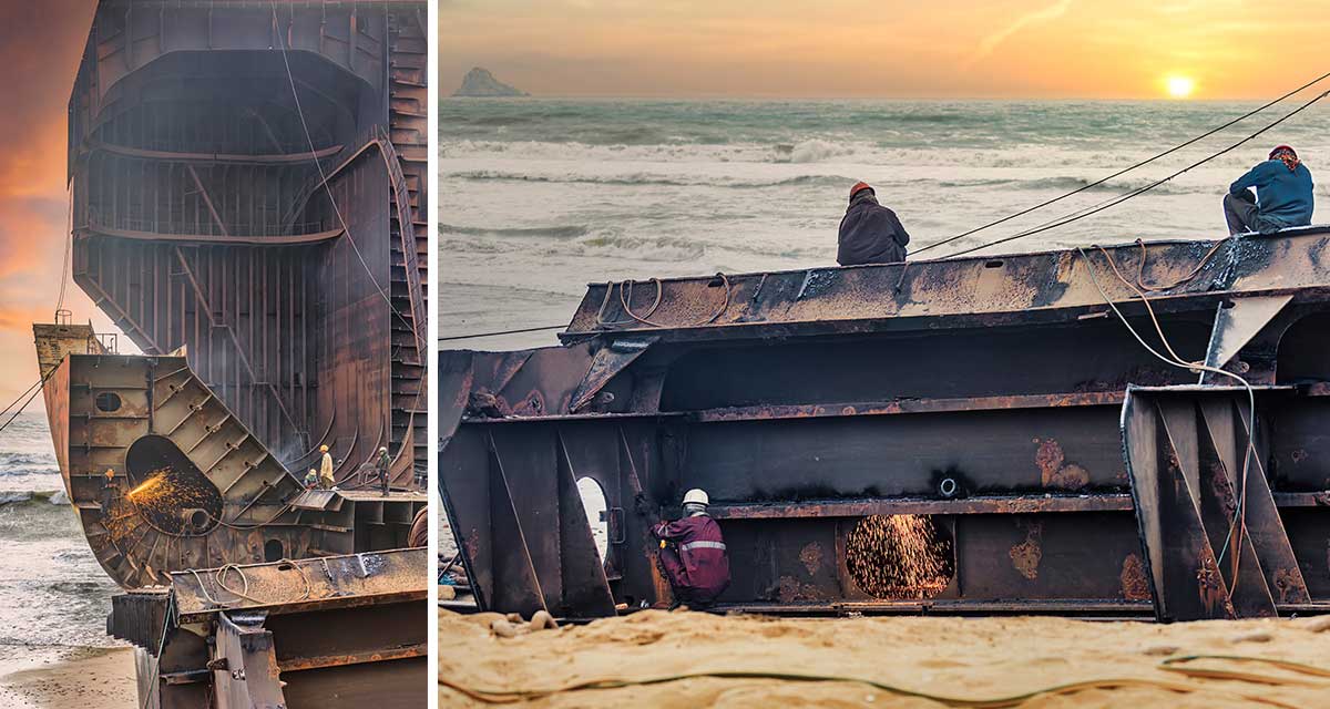 Workers dismantling an old ship on the beach as part of a green ship recycle process