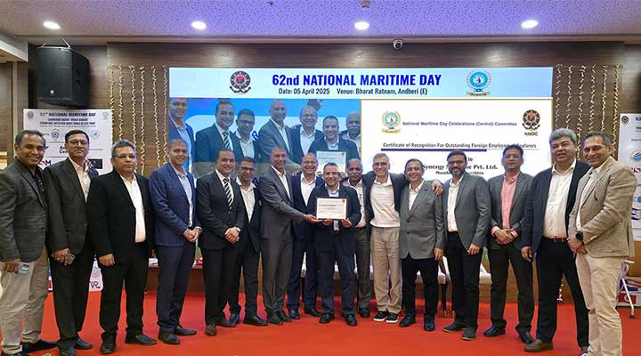 : Entire Synergy team receiving the award from Shri Shyam Jagannathan, IAS.