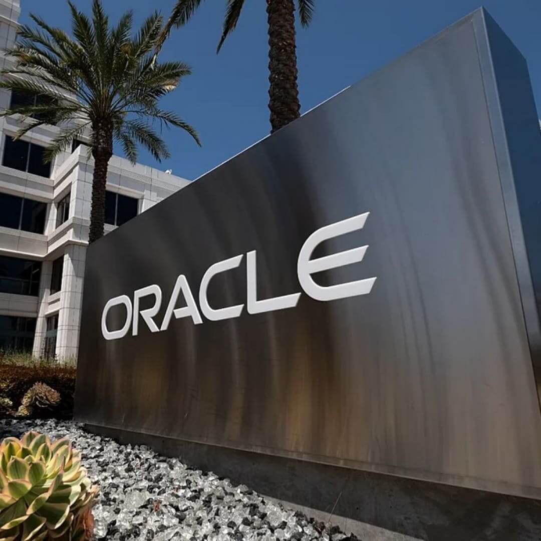 Oracle headquarters signboard with logo outside the company building.