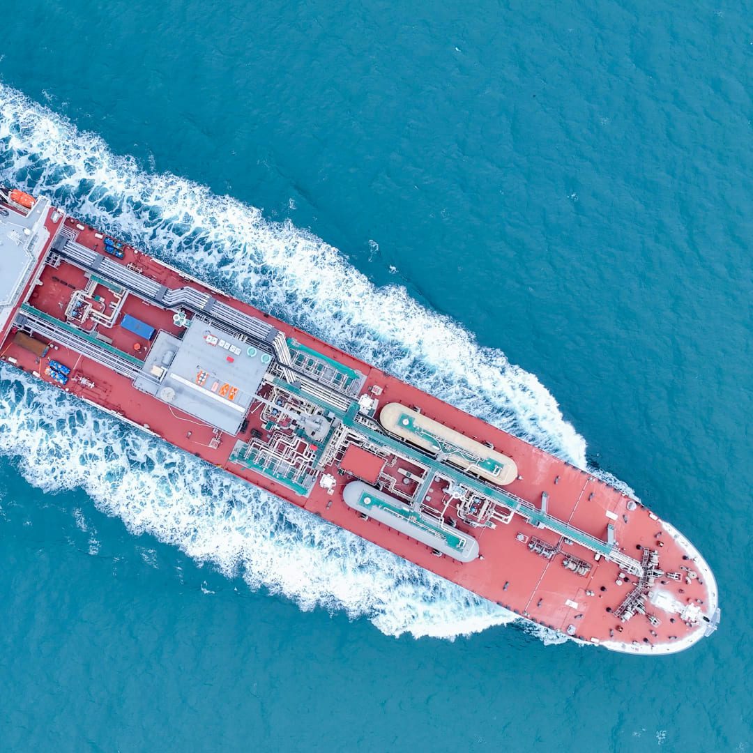 Aerial view of a dual fuel vessel Mirai sailing through open blue waters